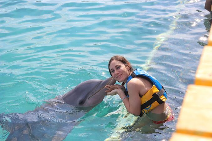 Experiencia de nado con delfines en la Riviera Maya con Dolphin Discovery Puerto Aventuras